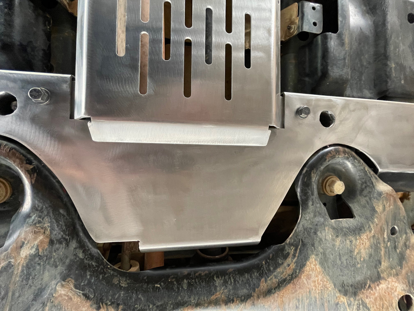 Gleaming Alloy XOPLATE Exhaust Skid plate.